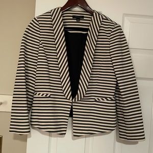 Stylish pin-striped suit coat.